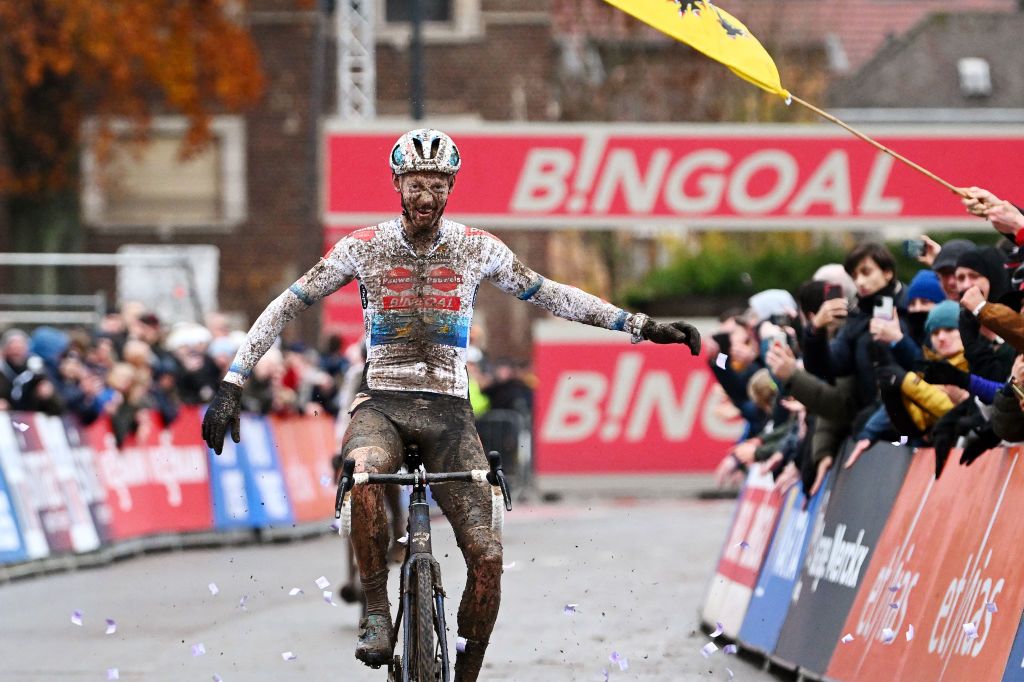 OVERIJSE BELGIUM NOVEMBER 20 Michael Vanthourenhout of Belgium and Team Pauwels Sauzen Bingoal celebrates at finish line as race winner ahead of Thomas Pidcock of United Kingdom and Team INEOS Grenadiers during the 62nd UCI Cyclocross World Cup Druivencross Overijse 2022 Mens Elite CXWorldCup Overijse Cyclocross on November 20 2022 in Overijse Belgium Photo by Luc ClaessenGetty Images