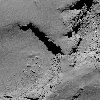 Rosetta’s OSIRIS camera captured this image of Comet 67P at 0818 GMT from an altitude of about 5.8 km during the spacecraft’s final descent on Sept. 30, 2016. The image scale is about 11 cm/pixel and the image measures about 225 meters across.