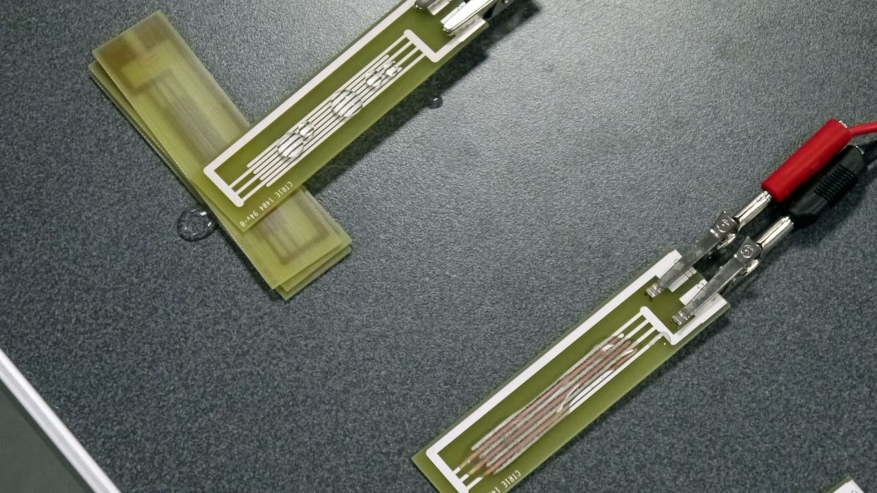 Passing a current through the circuit boards and the untreated board (R) suffers obvious corrosion while the P2i coated board (L) remains unharmed
