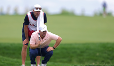 Chris Gotterup lines up a putt