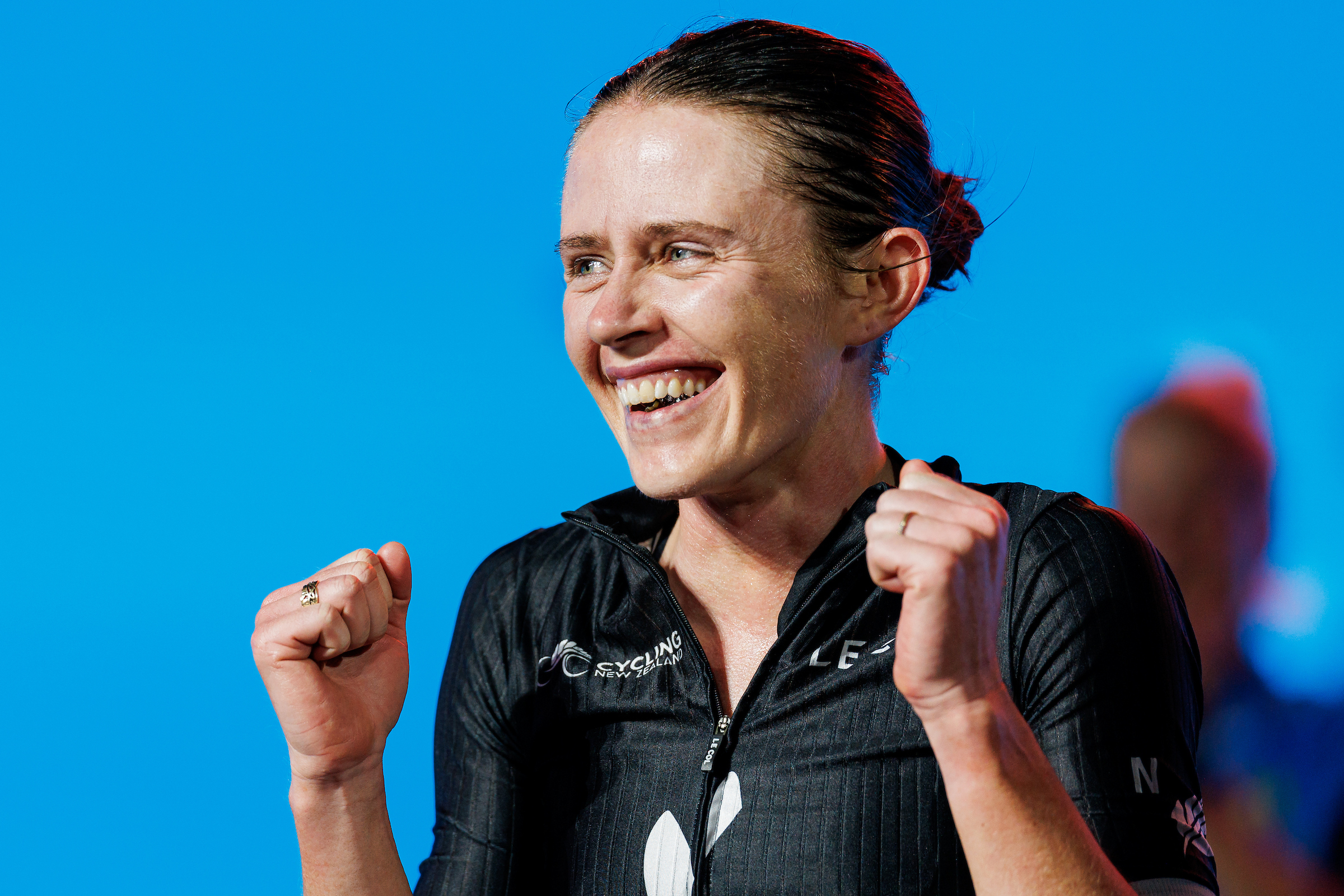 Mary Kate McCarthy celebrates after winning the 2024 Cycling Esports World Championships