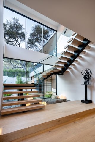 dramatic staircase in Jae Omar home in California