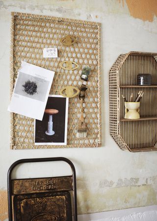 home office pinboard made from bamboo and small rattan shelf