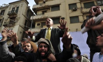 Muslim Brotherhood member Mohamed el-Balatagy (top-center) protests in Cairo's Tahrir Square last week.