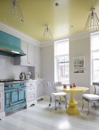 modern kitchen with pastel yellow ceiling