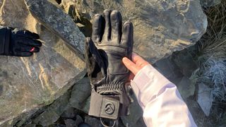 Hiker's hand holding The North Face Summit Series Patrol Gore-Tex Glove