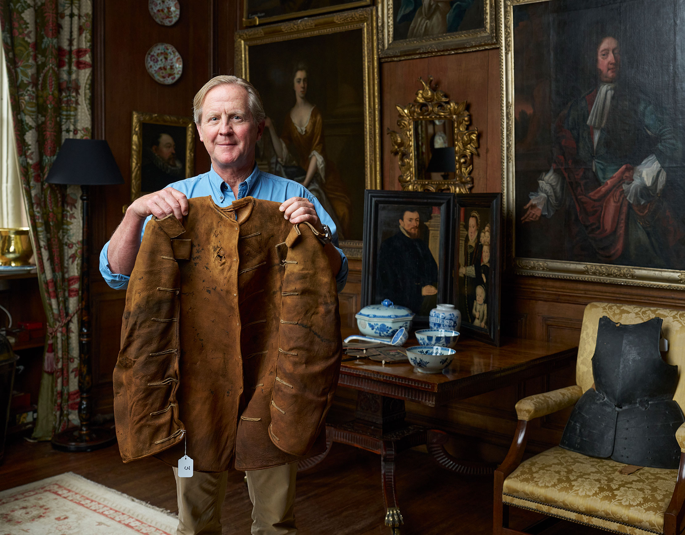 James Birch holds John Hussey's coat and armour at Doddginton Hall 