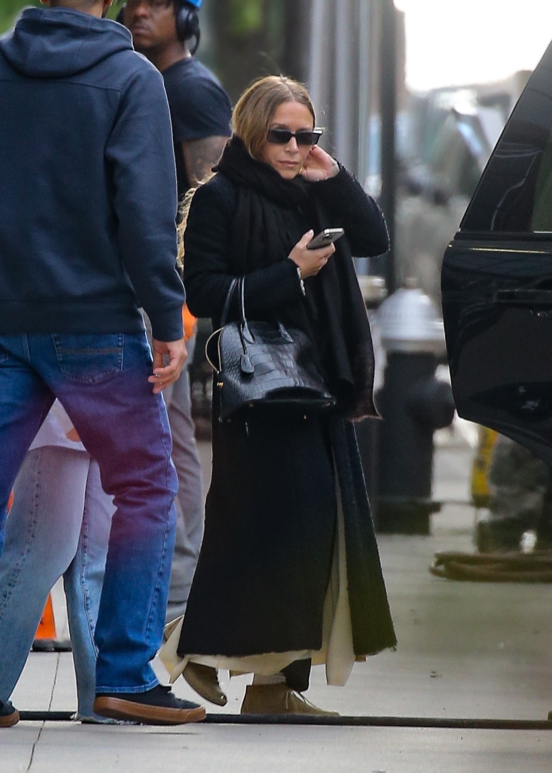 An image of Mary-Kate Olsen wearing a &pound;25,000 crocodile bag with lace-up moccasins.