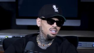 Chris Brown recalls how he was discovered during an interview on the R&B Money Podcast