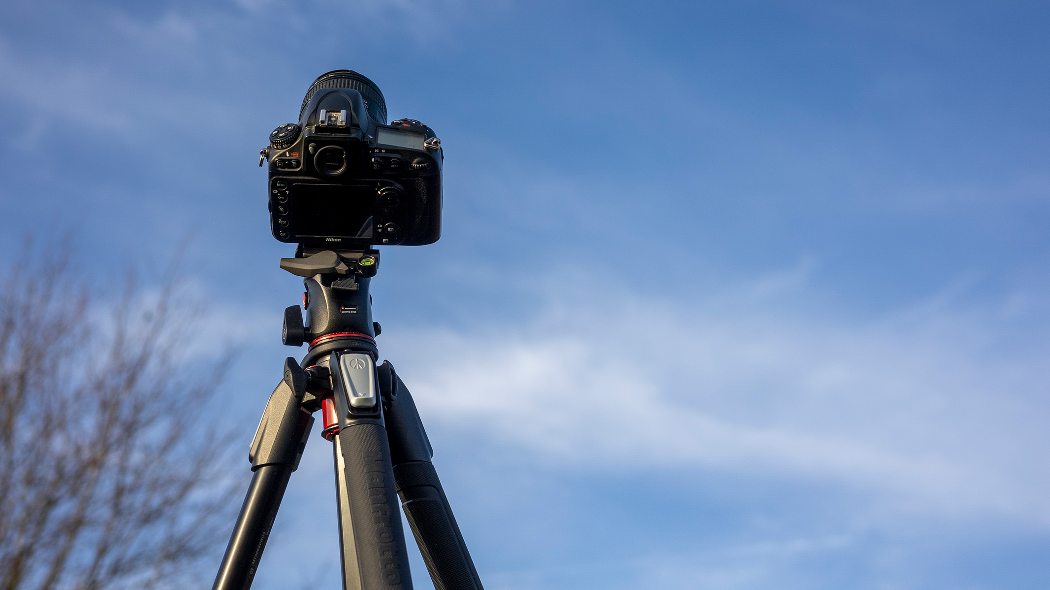 A picture of the Manfrotto tripod with the camera facing the sky