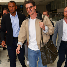 Pedro Pascal wears large Bottega Veneta Bag