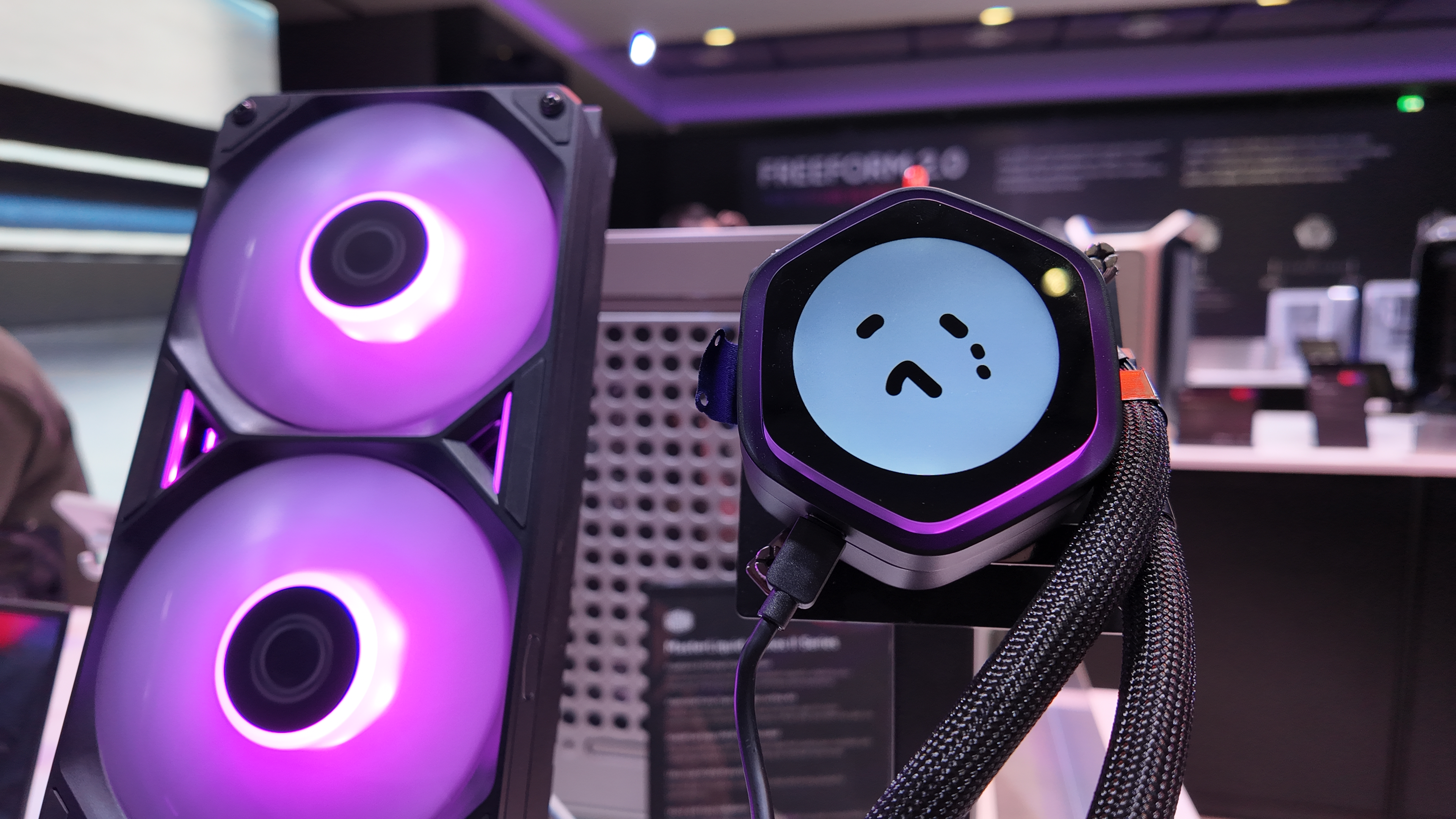 Cooler Master’s new liquid cooler has modular tops, which have been used to show off a crying face on a screen and now I’m sad