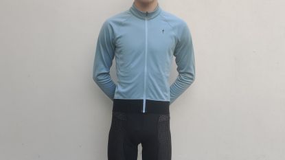 Image shows a rider wearing the Specialized RBX Expert Thermal Long Sleeve Jersey.