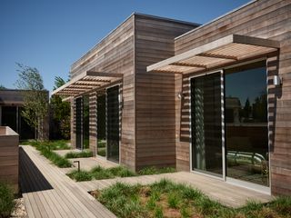 Wooden exterior of Shou Sugi Ban House in the Hamptons New York