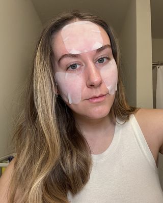 Beauty editor Kaitlyn McLintock wearing Korean toner pads on her face