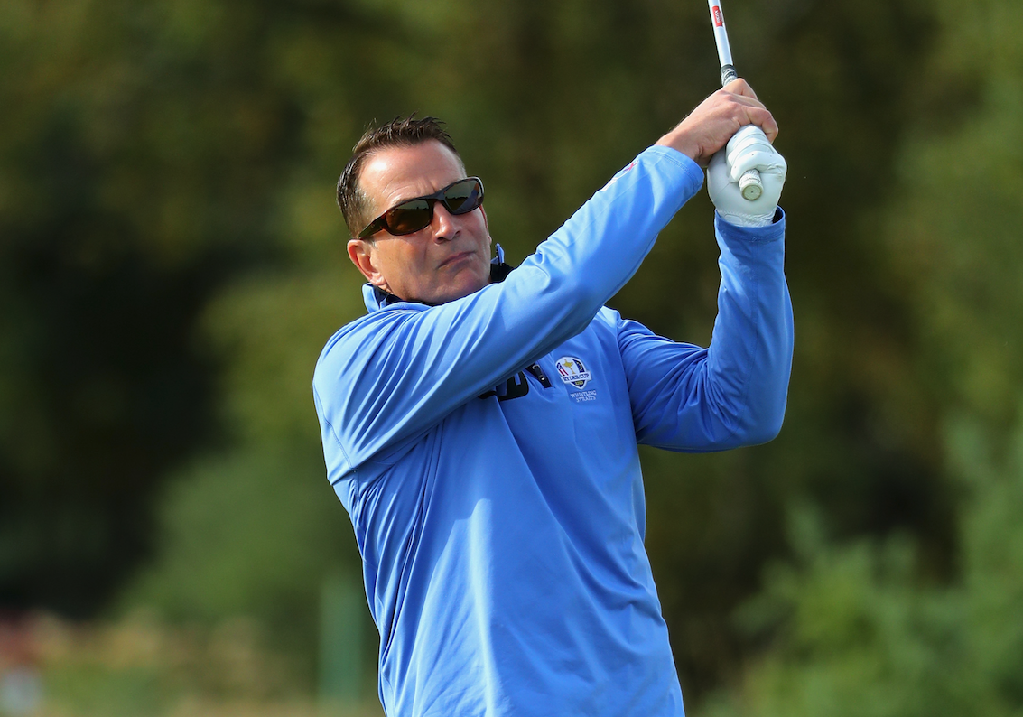 David Kohler holds his finish on an iron shot