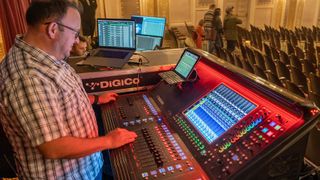 A sound engineer mixes a show using DiGiCo solutions.