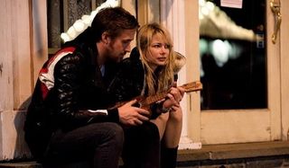Blue Valentine Ryan Gosling Michelle Williams huddled on the street with a ukelele