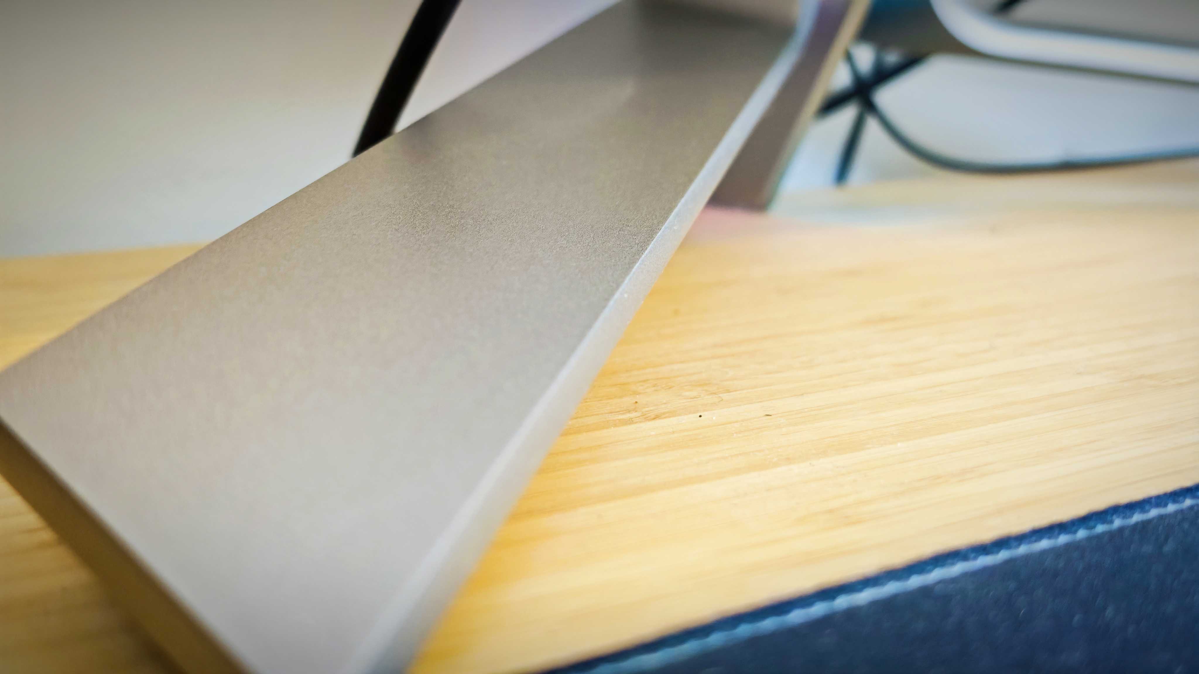 An AOC AGON PD34 monitor on a desk