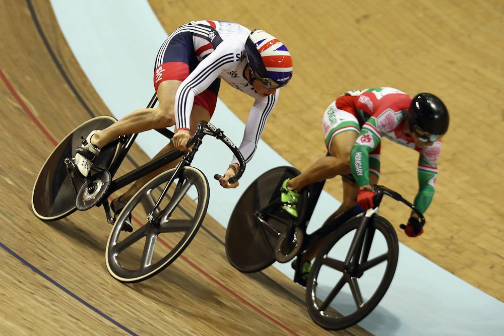 e Truman of Great Britain races against Sandor Szalontay of Hungary during the Men's Sprint