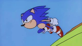 A cartoon Sonic runs across a hill