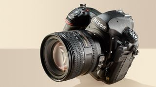 Best professional camera the Nikon D850 on a beige background