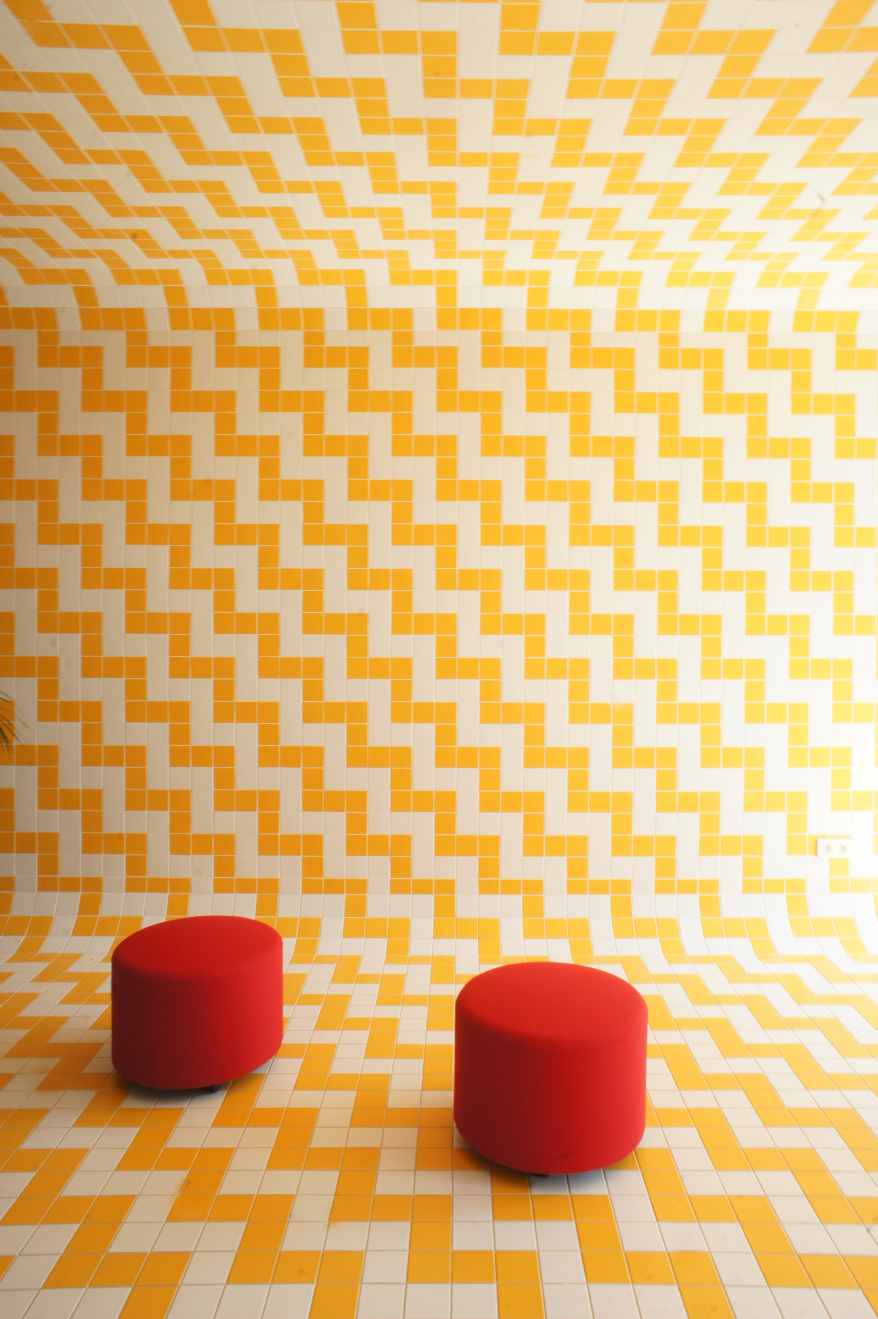 bright yellow tiles at Heyday office in Belgium