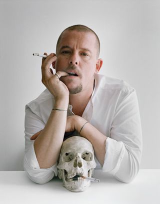 Alexander McQueen with skull and cigarettes