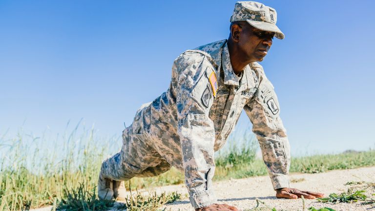 Army person doing push ups