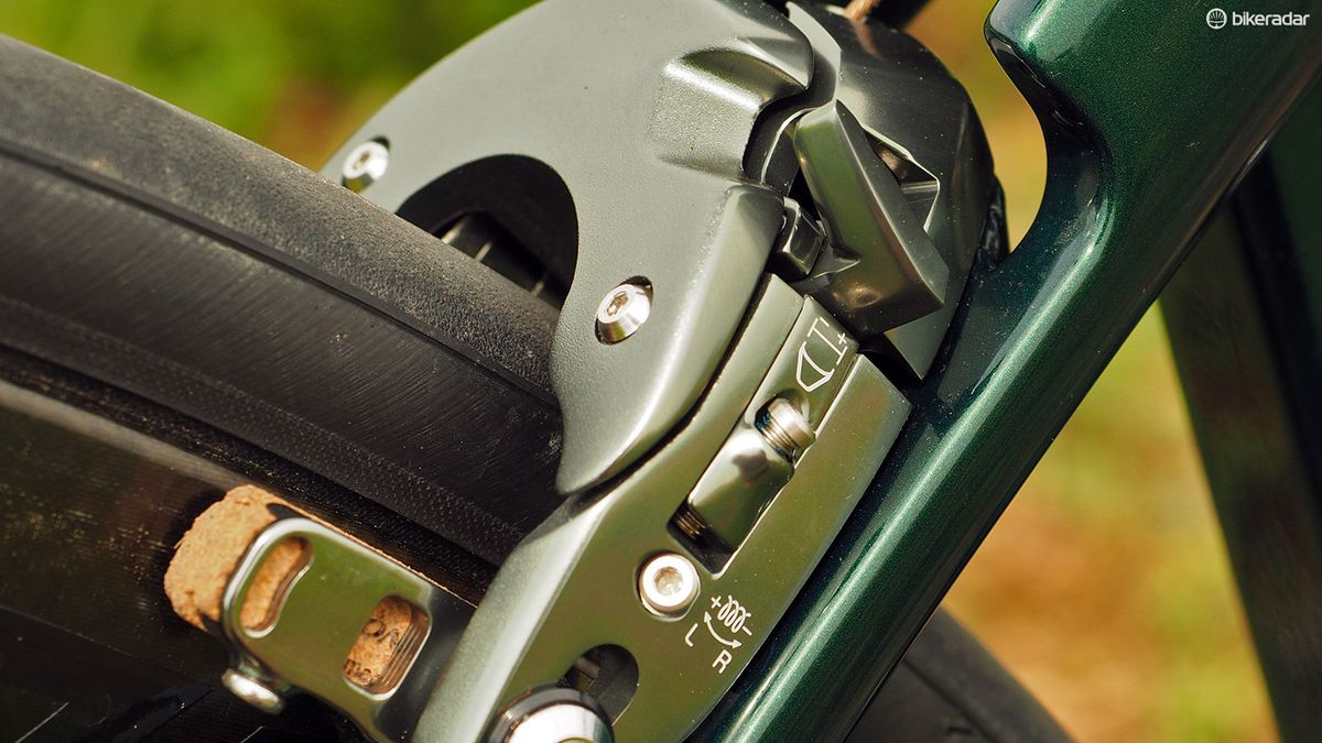 There are separate, independent adjustments for both arm position and spring tension on each side. They're clearly marked, too, to help with setup and maintenance. A tidy quick-release lever is built into the caliper, too