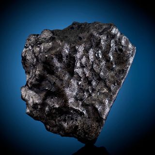 This 1.6-ounce (46-gram) meteorite, a part of the Tissint meteorite that landed in Morocco in July 2011, fetched $43,750 at a public auction on May 20. 