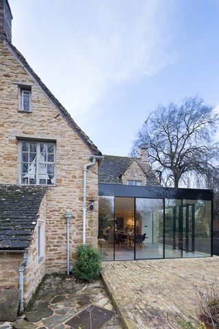period property cottage with glass sliding doors by IQ Glass