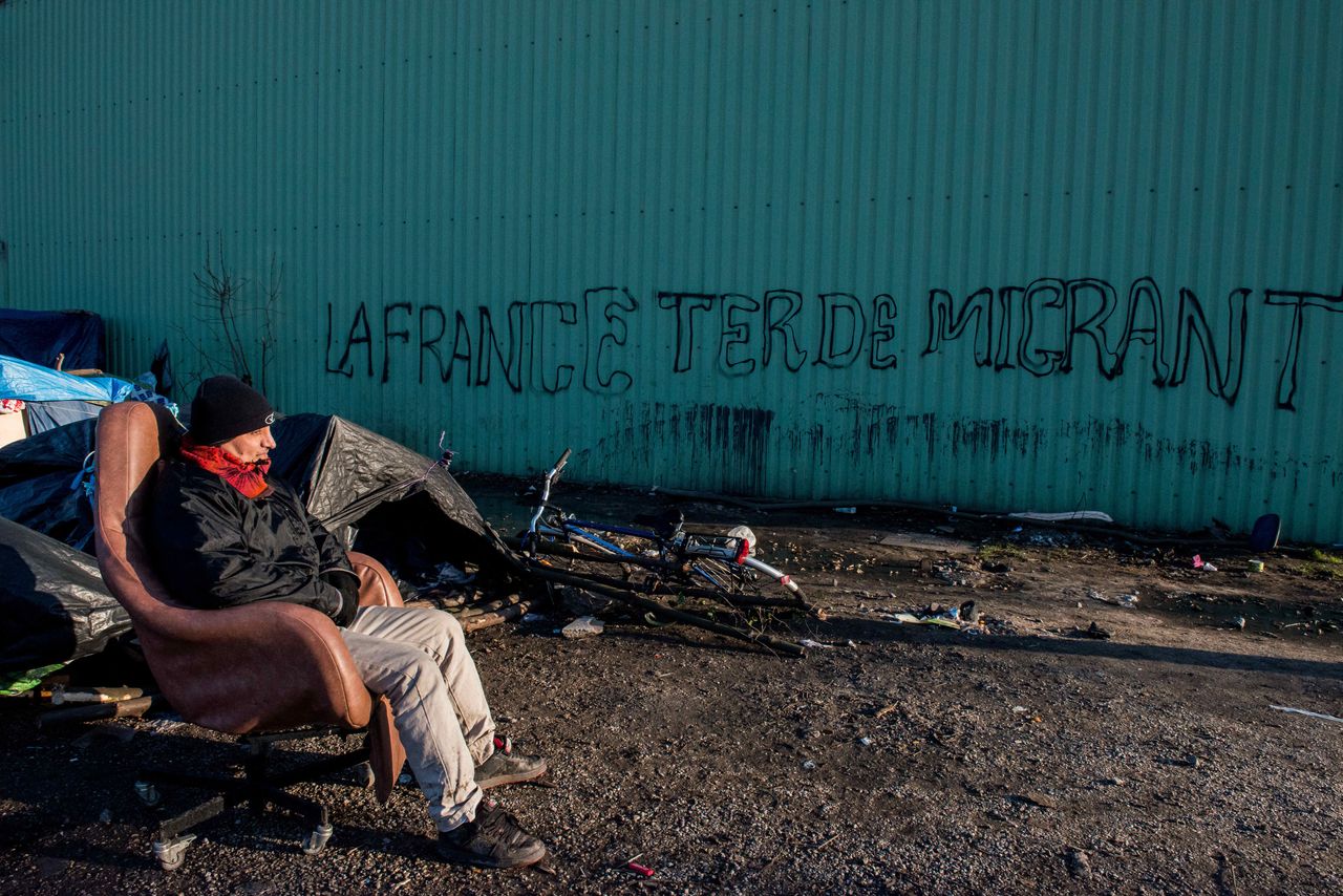 Migrants live in harsh conditions on the outskirts of French port Calais. 