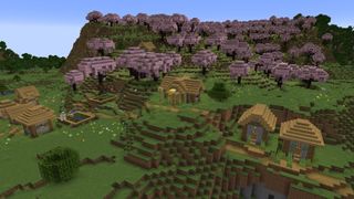 Minecraft seeds - a small village borders a cherry blossom forest