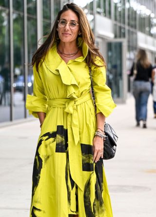 Miki LaSalle is seen wearing a lime green and black belted dress and black boots during Miami Art Week & Art Basel Miami 2024 on December 04, 2024 in Miami, Florida.