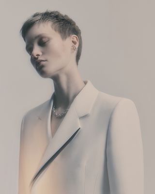 Portrait of woman in tailored jacket