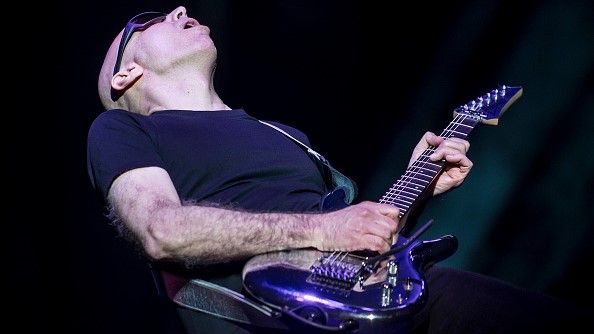 Joe Satriani performs during the G3 concert at Eventim Apollo on April 25, 2018 in London