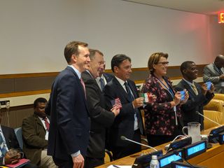 George Whitesides (left), CEO of Virgin Galactic, presented flags to speakers at UNOOSA's event at the 2019 UNGA on Sept. 23, 2019.
