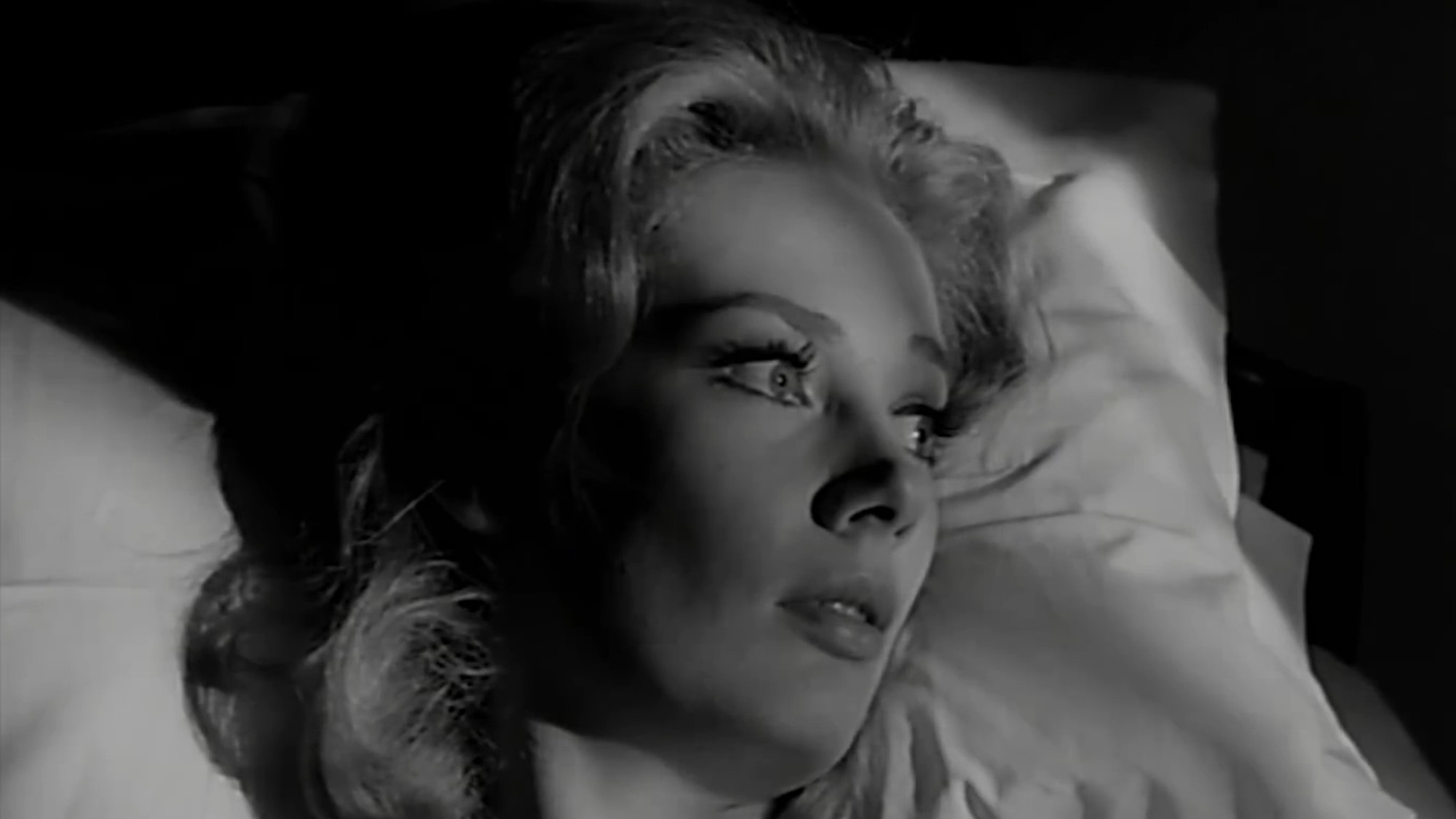 Candace Hilligoss up late at night in Carnival of Souls