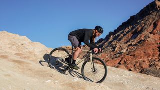 Enve MOG gravel bike being ridden down a rutted rock face