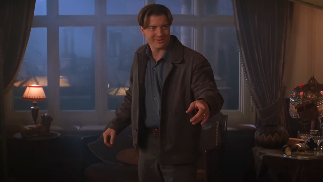 Brendan Fraser points while talking in his study in The Mummy Returns.