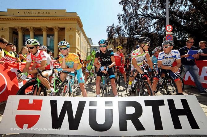 Race leader Kevin Seeldraeyers (Astana) lines up next to Joe Dombrowski in Innsbruck