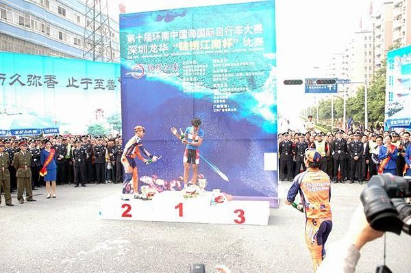 Champagne fight on the podium after stage 2: Joe Papp (left) and Derek Wong (right) of Champion System ganged up on stage winner Wong Kam Po.
