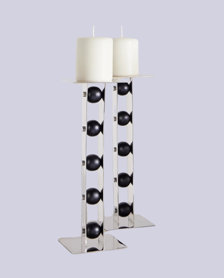 FOURTH STREET, Set of Three Iron and Steel Candlesticks