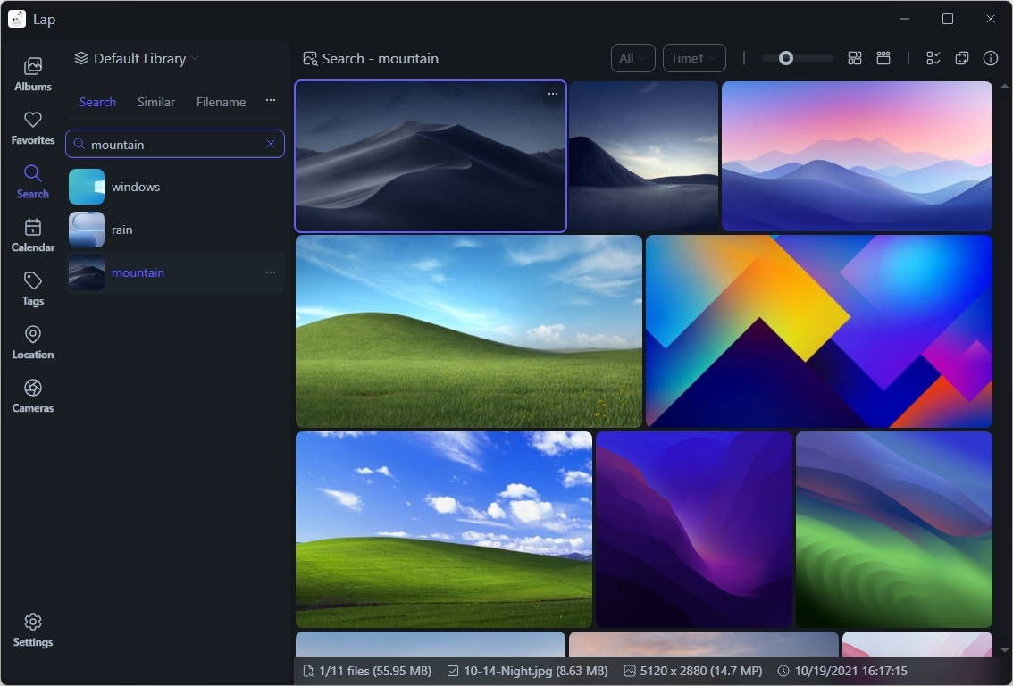 A digital library interface displaying mountain images with vibrant landscapes, abstract art, and rolling hills. The interface is sleek and modern.