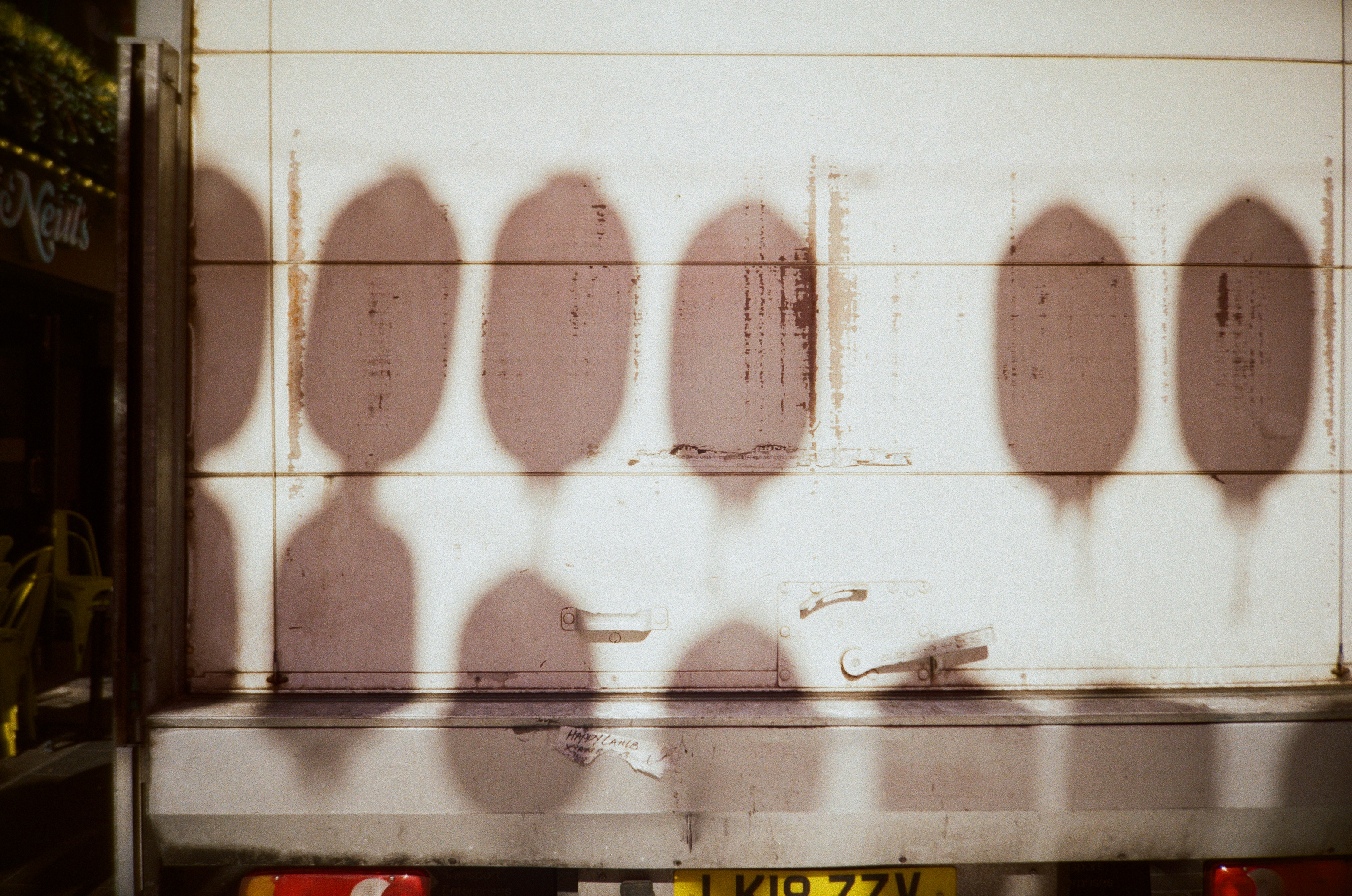 Scan of Lomo MC-A image shot on Kodak Gold 200 showing London street scenes