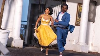 Bel and The Doctor running out of a building in Doctor Who season 2 episode 2 'Lux'