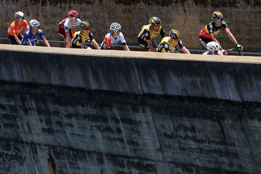 The riders pass over the Pardee Dam during stage 5 of the 2018 Tour of California