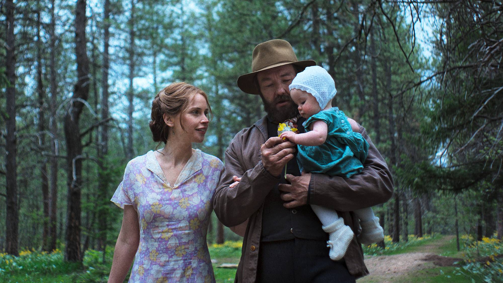 Felicity Jones as Gladys and Joel Edgerton as Robert Grainier in &quot;Train Dreams&quot; on Netflix