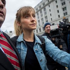 actress allison mack leaves us district court for the eastern district of new york after a bail hearing, april 24, 2018 in the brooklyn borough of new york city mack was charged last friday with sex trafficking for her involvement with a self help organization for women that forced members into sexual acts with their leader the group, called nxivm, was led by founder keith raniere, who was arrested in march on sex trafficking charges she was released on bail at 5 million photo by drew angerergetty images